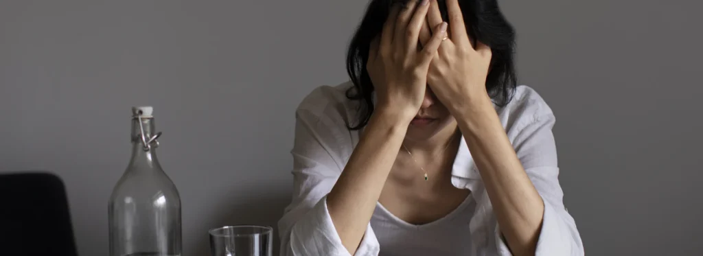 woman struggling with alcohol